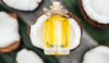 selective-focus-of-coconut-oil-in-bottle-on-white